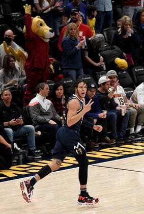 Denver Nuggets forward Aaron Gordon celebrates after scoring three points against the Orlando Magic during a NBA, Basketball Herren, USA game at the Ball Arena in Denver, CO, USA, 14 February 2022. Orlando Magic at Denver Nuggets !ACHTUNG: NUR REDAKTIONELLE NUTZUNG!  Copyright: xToddxPiersonx AME5756 20220215-9688b89e7c03a70d316dfd2e7b6196a3a09f5987