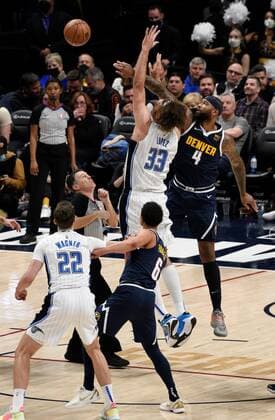 Denver Nuggets center DeMarcus Cousins (R) wins the jump ball against Orlando Magic center Robin Lopez, during a NBA, Basketball Herren, USA game at the Ball Arena in Denver, CO, USA, 14 February 2022. Orlando Magic at Denver Nuggets !ACHTUNG: NUR REDAKTIONELLE NUTZUNG!  Copyright: xToddxPiersonx AME5776 20220215-872215ba86170912ef050368160b8c8acbd9c23c