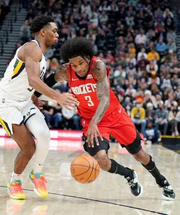 Kevin Porter Jr. (R) of the Houston Rockets in action against Trent Forrest (L) of the Utah Jazz, during a NBA, Basketball Herren, USA game at the Vivint Smart Home Arena in Salt Lake City, Utah, USA, 14 February 2022. Houston Rockets at Utah Jazz !ACHTUNG: NUR REDAKTIONELLE NUTZUNG!  Copyright: xGEORGExFREYx AME5819 20220215-93badd73bf8e5e975cf948ba336006b3763e9ef1