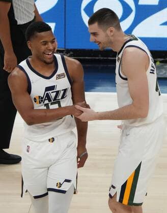 Juancho Hernangomez (R) of the Utah Jazz greets his teammate Jared Butler (L) after an NBA, Basketball Herren, USA game between Utah Jazz and Houston Rockets, at the Vivint Smart Home Arena in Salt Lake City, Utah, USA, 14 February 2022. Houston Rockets at Utah Jazz !ACHTUNG: NUR REDAKTIONELLE NUTZUNG!  Copyright: xGEORGExFREYx AME5830 20220215-7e6aa554fde198f3e1fb98ed5cdf0376aff0a34a