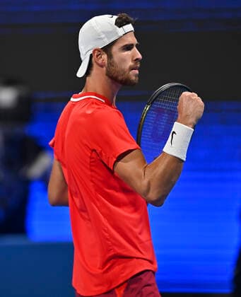 (220215) -- DOHA, Feb. 15, 2022 -- Karen Khachanov of Russia reacts after winning the first round of ATP, Tennis Herren Qatar Open tennis match against Mackenzie McDonald of the United States in Doha, capital of Qatar, Feb. 14, 2022. (Photo by Xinhua) (SP)QATAR-DOHA-TENNIS-ATP QATAR OPEN Nikku 