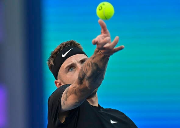 (220215) -- DOHA, Feb. 15, 2022 -- Alex Molcan of Slovakia serves to Christopher O Connell of Australia during the first round of ATP, Tennis Herren Qatar Open tennis match in Doha, capital of Qatar, Feb. 14, 2022. (Photo by Xinhua) (SP)QATAR-DOHA-TENNIS-ATP QATAR OPEN Nikku 