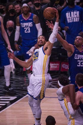 February 14, 2022, Los Angeles, California, USA: Otto Porter Jr. 32 of the Golden State Warriors grabs the rebound during their NBA, Basketball Herren, USA game against the Los Angeles Clippers on Monday February 14, 2022 at Crypto.com Arena in Los Angeles, California. Clippers defeat Warriors, 119-104. ARIANA RUIZ PI Los Angeles USA - ZUMAp124 20220214_zaa_p124_028 Copyright: xArianaxRuizx