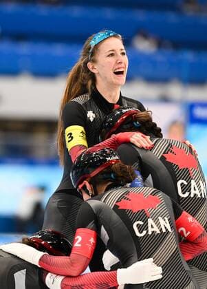 China Olympics 2022 Speed skating, Eisschnelllauf Women Team Pursuit 8115437 15.02.2022 Canada s Ivanie Blondin, Alexa Scott, Isabelle Weidemann and Valerie Maltais celebrate winning the women s speed skating team pursuit final during the Beijing 2022 Winter Olympic Games, Olympische Spiele, Olympia, OS at the National Speed Skating Oval in Beijing, China. Vladimir Astapkovich Sputnik Beijing China  Copyright: xVladimirxAstapkovichx