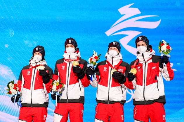 OLYMPICS - Winter Olympic Games, Olympische Spiele, Olympia, OS Beijing 2022 ZHANGJIAKOU,CHINA,15.FEB.22 - OLYMPICS, NORDIC SKIING, Ski jumping, Skispringen, Ski, nordisch - Winter Olympic Games Beijing 2022, large hill, men, team event, award ceremony. Image shows the rejoicing of Stefan Kraft, Daniel Huber, Jan Hoerl and Manuel Fettner (AUT). GEPAxpictures xMaticxKlansek