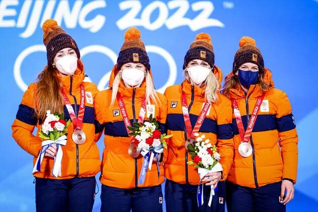 BEIJING lr Dutch speed skaters Antoinette de Jong, Marijke Groenewoud, Irene Schouten and Ireen Wust of TeamNL are honored at Beijing Medal Plaza for their bronze medal in the team pursuit at the 2022 Winter Olympics in Beijing, China ANP VINCENT JANNINK Speed Skating Medal Ceremony 2022 xVIxANPxSportx xxANPxIVx 444174884 originalFilename: 444174884.jpg