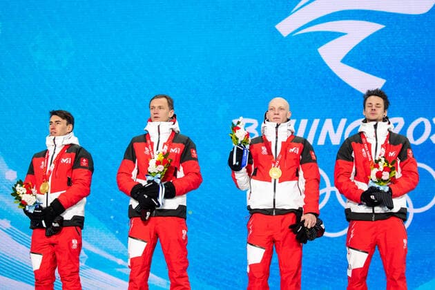 OLYMPICS - Winter Olympic Games, Olympische Spiele, Olympia, OS Beijing 2022 ZHANGJIAKOU,CHINA,15.FEB.22 - OLYMPICS, NORDIC SKIING, Ski jumping, Skispringen, Ski, nordisch - Winter Olympic Games Beijing 2022, large hill, men, team event, award ceremony. Image shows the rejoicing of Stefan Kraft, Daniel Huber, Jan Hoerl and Manuel Fettner (AUT). Keywords: medals. GEPAxpictures xMaticxKlansek
