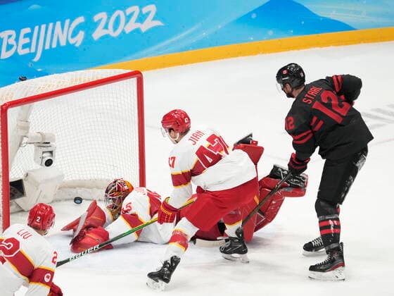 February 15, 2022, Beijing, China: Team Canada forward Eric Staal (12) looks on as a shot by teammate Jordan Weal (not shown) eludes Team China goaltender Jeremy Smith for a goal during first period men s qualification round hockey action at the Beijing Winter Olympics in Beijing, China, on Tuesday, Feb. 15, 2022. Canada News - February 15, 2022  - ZUMAc35_ 20220215_zaf_c35_112 Copyright: xRyanxRemiorzx