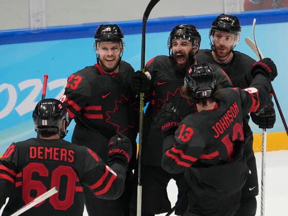 February 15, 2022, Beijing, China: Team Canada players (left to right) Jason Demers (60), Tyler Wotherspoon (23), Eric O Dell (19), Kent Johnson (13) and and Ben Street (10) celebrate O Dell s goal against Team China during second period men s qualification round hockey action at the Beijing Winter Olympics in Beijing, China, on Tuesday, Feb. 15, 2022. Canada News - February 15, 2022  - ZUMAc35_ 20220215_zaf_c35_122 Copyright: xRyanxRemiorzx