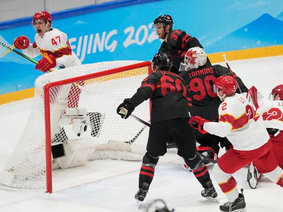 February 15, 2022, Beijing, China: Team China forward An Jian (47) celebrates his goal past Team Canada goalkeeper Matt Tomkins (90) as Canada s Jason Demers (60) and Mat Robinson (37) look on during second period men s qualification round hockey action at the Beijing Winter Olympics in Beijing, China, on Tuesday, Feb. 15, 2022. Canada News - February 15, 2022  - ZUMAc35_ 20220215_zaf_c35_123 Copyright: xRyanxRemiorzx