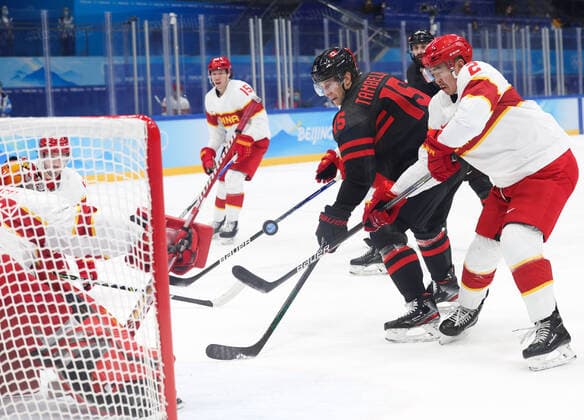 (220215) -- BEIJING, Feb. 15, 2022 -- Goalkeeper Shimisi Jieruimi (C) of China falls after being injured during the Ice hockey, Eishockey men s qualification play-off of Beijing 2022 Winter Olympics between Canada and China at Wukesong Sports Centre, in Beijing, capital of China, Feb. 15, 2022. ) (BEIJING2022)CHINA-BEIJING-OLYMPIC Winter games, Winterspiele,Spiele, Summer games ICE HOCKEY-MEN S QUALIFICATION PLAY-OFF-CAN VS CHN (CN) MengxYongmin 