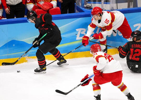 (220215) -- BEIJING, Feb. 15, 2022 -- Fu Jiang (3rd L) of China vies with Jordan Weal of Canada during the Ice hockey, Eishockey men s qualification play-off of Beijing 2022 Winter Olympics between Canada and China at Wukesong Sports Centre, in Beijing, capital of China, Feb. 15, 2022. ) (BEIJING2022)CHINA-BEIJING-OLYMPIC Winter games, Winterspiele,Spiele, Summer games ICE HOCKEY-MEN S QUALIFICATION PLAY-OFF-CAN VS CHN (CN) LixZiheng 