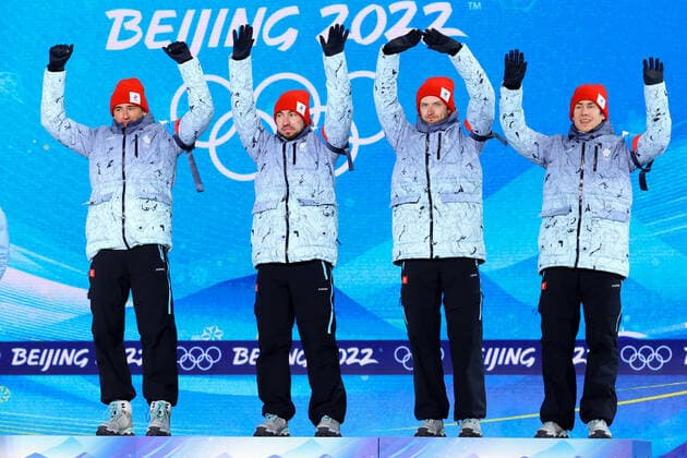 BEIJING 2022, Biathlon, 4x7,5km Staffel Männer, Siegerehrung ZHANGJIAKOU, CHINA - FEBRUARY 16, 2022: ROC athletes Said Karimulla Khalili, Alexander Loginov, Maxim Tsvetkov and Eduard Latypov (L-R) celebrate their bronze medals during the men s biathlon relay victory ceremony at the Medal Plaza as part of the 2022 Winter Olympic Games, Olympische Spiele, Olympia, OS Stanislav Krasilnikov TASS TS123900