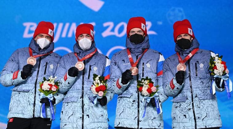 BEIJING 2022, Biathlon, 4x7,5km Staffel M?nner, Siegerehrung China Olympics 2022 Medal Ceremony 8117016 16.02.2022 Bronze medalists Russian Olympic Committee s Said Karimulla Khalili, Alexander Loginov, Maxim Tsvetkov and Eduard Latypov celebrate during an award ceremony for the biathlon men s 4x7.5 km relay event during the Beijing 2022 Winter Olympic Games, Olympische Spiele, Olympia, OS at the Medals Plaza in Zhangjiakou, China. Alexey Filippov Sputnik Beijing China Copyright: xAlexeyxFilippovx