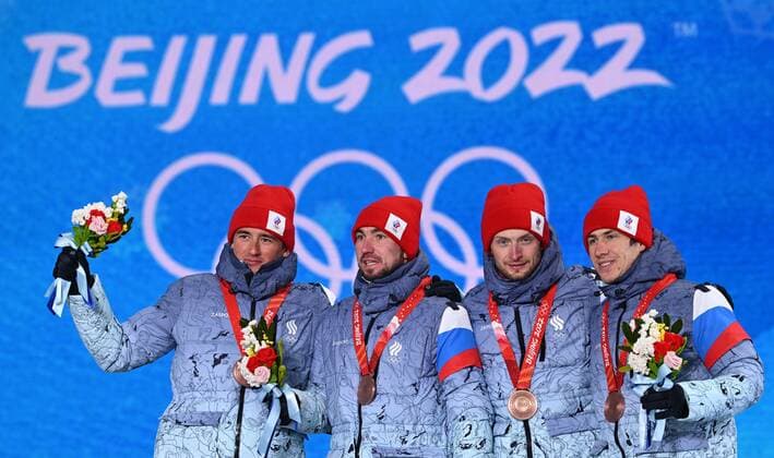 BEIJING 2022, Biathlon, 4x7,5km Staffel M?nner, Siegerehrung China Olympics 2022 Medal Ceremony 8117009 16.02.2022 Bronze medalists Russian Olympic Committee s Said Karimulla Khalili, Alexander Loginov, Maxim Tsvetkov and Eduard Latypov celebrate during an award ceremony for the biathlon men s 4x7.5 km relay event during the Beijing 2022 Winter Olympic Games, Olympische Spiele, Olympia, OS at the Medals Plaza in Zhangjiakou, China. Alexey Filippov Sputnik Beijing China Copyright: xAlexeyxFilippovx