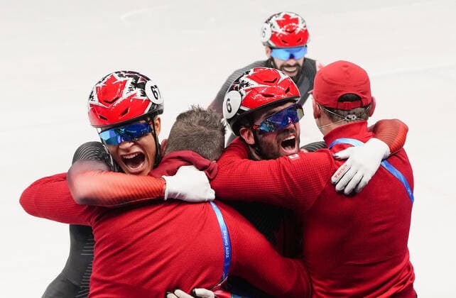 (220216) -- BEIJING, Feb. 16, 2022 -- Team Canada celebrate after winning the gold medal in the men s 5,000m relay final of short track Speed skating, Eisschnelllauf at Capital Indoor Stadium in Beijing, capital of China, Feb. 16, 2022. ) (BEIJING2022)CHINA-BEIJING-OLYMPIC Winter games, Winterspiele,Spiele, Summer games SHORT TRACK SPEED SKATING (CN) WangxYuguo