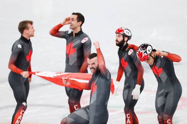 (220216) -- BEIJING, Feb. 16, 2022 -- Team Canada celebrate after winning the gold medal in the men s 5,000m relay final of short track Speed skating, Eisschnelllauf at Capital Indoor Stadium in Beijing, capital of China, Feb. 16, 2022. ) (BEIJING2022)CHINA-BEIJING-OLYMPIC Winter games, Winterspiele,Spiele, Summer games SHORT TRACK SPEED SKATING (CN) YangxLei