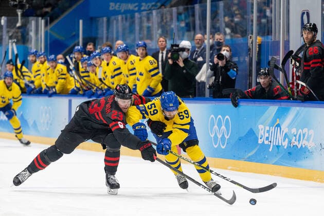 220216 Tyler Wotherspoon of Canada and Linus Johansson of Sweden in the men ices ice hockey quarterfinal between Sweden and Canada during day 12 of the 2022 Winter Olympics on February 16, 2022 in Beijing Photo Maxim Thore BILDBYRAN kod MT MT0326 ice hockey ice hockey olympic games olympics winter olympics os ol olympic games winter os olympic games beijing peking 2022 beijing 2022 beijing 2022 olympic games beijing 2022 winter olympic games beijing os beijing ol winter ol 12 bbeng quarter final sweden canada,  Copyright: MAXIMxTHORE BB220216MT107