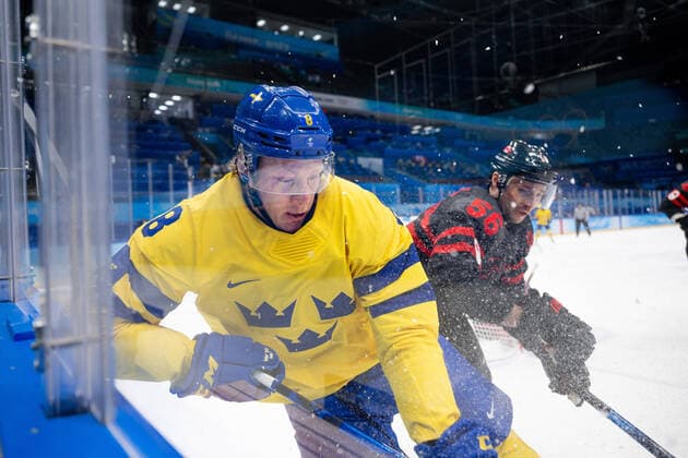 220216 Fredrik Olofsson of Sweden and Maxim Noreau of Canada in the men ices ice hockey quarterfinal between Sweden and Canada during day 12 of the 2022 Winter Olympics on February 16, 2022 in Beijing Photo Maxim Thore BILDBYRAN kod MT MT0326 ice hockey ice hockey olympic games olympics winter olympics os ol olympic games winter os olympic games beijing peking 2022 beijing 2022 beijing 2022 olympic games beijing 2022 winter olympic games beijing os beijing ol winter ol 12 bbeng quarter final sweden canada,  Copyright: MAXIMxTHORE BB220216MT108
