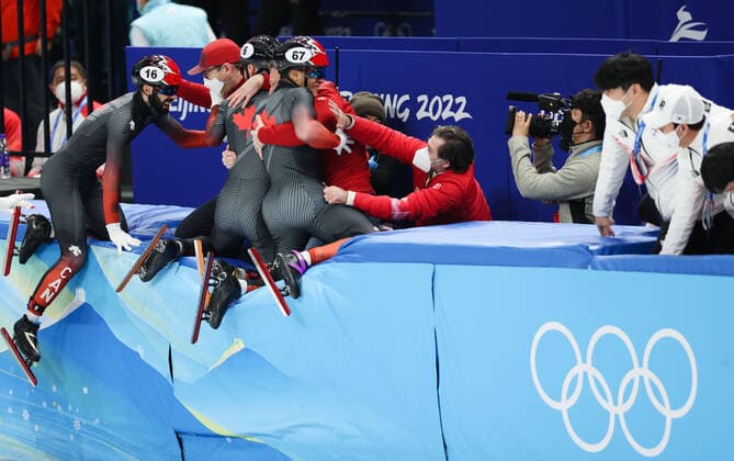 (220216) -- BEIJING, Feb. 16, 2022 -- Team Canada celebrate after winning the gold medal in the men s 5,000m relay final of short track Speed skating, Eisschnelllauf at Capital Indoor Stadium in Beijing, capital of China, Feb. 16, 2022. ) (BEIJING2022)CHINA-BEIJING-OLYMPIC Winter games, Winterspiele,Spiele, Summer games SHORT TRACK SPEED SKATING (CN) LanxHongguang