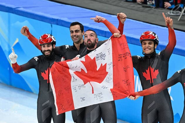 (220216) -- BEIJING, Feb. 16, 2022 -- Team Canada celebrate after winning the gold medal in the men s 5,000m relay final of short track Speed skating, Eisschnelllauf at Capital Indoor Stadium in Beijing, capital of China, Feb. 16, 2022. ) (BEIJING2022)CHINA-BEIJING-OLYMPIC Winter games, Winterspiele,Spiele, Summer games SHORT TRACK SPEED SKATING (CN) JuxHuanzong