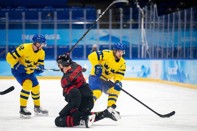 220216 Joakim Norström and Henrik Tömmernes of Sweden against Tyler Wotherspoon of Canada in the mens ice hockey quarterfinal between Sweden and Canada during day 12 of the 2022 Winter Olympics on February 16, 2022 in Beijing Photo Maxim Thore BILDBYRAN kod MT MT0326 ice hockey ice hockey olympic games olympics winter olympics os ol olympic games winter os olympic games peking peking 2022 beijing 2022 beijing 2022 olympic games beijing 2022 winter olympic games beijing os beijing ol winter ol 12 bbeng quarter final sweden canada,  Copyright: MAXIMxTHORE BB220216MT132