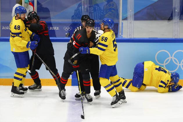 February 16, 2022, Beijing, Hebei, China: PUDAS Jonathan of Sweden (64) is lying on the floor during the Ice hockey, Eishockey Men s Play-offs Quarterfinals game between Sweden and Canada on February 16th in Beijing, China BEIJING 2022: DAY 12: MEN ICE HOCKEY: QUARTERFINALS: SWE v CAN  - ZUMAc179 20220216_zep_c179_124 Copyright: xMickaelxChavetx