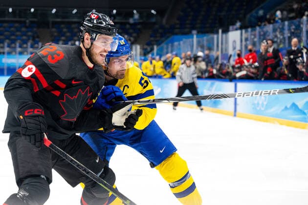 220216 Tyler Wotherspoon of Canada and Anton Lander of Sweden in the men ices ice hockey quarterfinal between Sweden and Canada during day 12 of the 2022 Winter Olympics on February 16, 2022 in Beijing Photo Maxim Thore BILDBYRAN kod MT MT0326 ice hockey ice hockey olympic games olympics winter olympics os ol olympic games winter os olympic games beijing peking 2022 beijing 2022 beijing 2022 olympic games beijing 2022 winter olympic games beijing os beijing ol winter ol 12 bbeng quarter final sweden canada,  Copyright: MAXIMxTHORE BB220216MT149