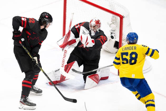220216 Anton Lander of Sweden against Owen Power and goaltender Matt Tomkins of Canada in the men ices ice hockey quarterfinal between Sweden and Canada during day 12 of the 2022 Winter Olympics on February 16, 2022 in Beijing Photo Mathias Bergeld BILDBYRAN kod MB MT0326 ishockey ice hockey olympic games olympics winter olympics os ol olympic games winter os olympic games peking peking 2022 beijing 2022 beijing 2022 olympic games beijing 2022 winter olympic games peking os beijing ol winter ol 12 bbeng quarter final sweden canada,  Copyright: MATHIASxBERGELD BB220216MB088