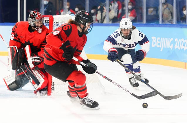 BEIJING, CHINA - FEBRUARY 17, 2022: Goaltender Ann-Renee Desbiens of Canada, supported by Emily Clark, defends against Alex Carpenter (L-R) of the US in their Ice hockey, Eishockey gold medal match at the Wukesong Arena as part of the 2022 Winter Olympic Games, Olympische Spiele, Olympia, OS Sergei Bobylev TASS  TS123B30