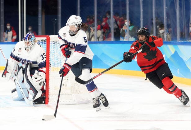 BEIJING, CHINA - FEBRUARY 17, 2022: Goaltender Alex Cavallini of the US, supported by Megan Keller, defends against Natalie Spooner (L-R) of Canada in their Ice hockey, Eishockey gold medal match at the Wukesong Arena as part of the 2022 Winter Olympic Games, Olympische Spiele, Olympia, OS Sergei Bobylev TASS  TS123B50