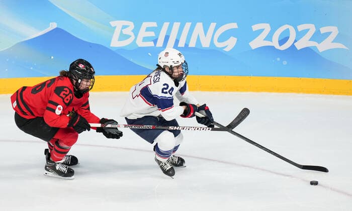(220217) -- BEIJING, Feb. 17, 2022 -- Dani Cameranesi (R) of the United States vies with Emily Clark of Canada during the Ice hockey, Eishockey women s gold medal game of Beijing 2022 Winter Olympics between Canada and the United States at Wukesong Sports Centre in Beijing, capital of China, Feb. 17, 2022. ) (BEIJING2022)CHINA-BEIJING-OLYMPIC Winter games, Winterspiele,Spiele, Summer games ICE HOCKEY-WOMEN S GOLD MEDAL GAME-CAN VS USA (CN) MengxYongmin 