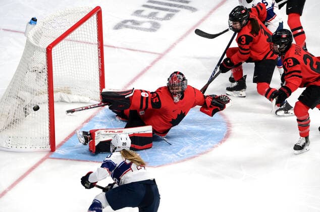 (220217) -- BEIJING, Feb. 17, 2022 -- Goalkeeper Ann-Renee Desbiens (2nd L) of Canada defends during the Ice hockey, Eishockey women s gold medal game of Beijing 2022 Winter Olympics between Canada and the United States at Wukesong Sports Centre in Beijing, capital of China, Feb. 17, 2022. ) (BEIJING2022)CHINA-BEIJING-OLYMPIC Winter games, Winterspiele,Spiele, Summer games ICE HOCKEY-WOMEN S GOLD MEDAL GAME-CAN VS USA (CN) LixAn 