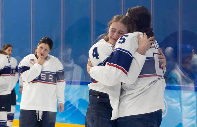 February 17, 2022, BEIJING, HEBEI, China: Wukesong Sports Centre: Ice hockey, Eishockey ¢â‚¬WomenÃ¢â‚¬â ¢s GOLD match USA vs Canada. USAÃ¢â‚¬â ¢s dejected team after the loss.USAÃ¢â‚¬â ¢s Caroline HARVEY940 AND MEGAN KELLER HUG. Beijing 2022: Ice Hockey Women s  - ZUMAa35_ 20220217_zaf_a35_016 Copyright: xDanielxA.xAndersonx