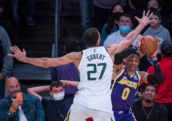 February 16, 2022, Los Angeles, California, USA: Russell Westbrook 0 of the Los Angeles Lakers tries to throw in the ball past Rudy Gobert 27 of the Utah Jazz during their NBA, Basketball Herren, USA game on Wednesday February 16, 2022 at Crypto.com Arena in Los Angeles, California. Lakers defeat Jazz, 106-101. PI Los Angeles USA - ZUMAp124 20220216_zaa_p124_039 Copyright: xJAVIERxROJASx