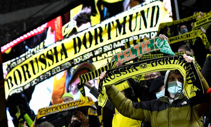 Football, UEFA Europe League, men, season 2021 22, knockout round play off first leg, Borussia Dortmund yellow Glasgow Rangers blue BVB fans fan, fans, fan culture, enthusiasm UEFA REGULATES PROHIBIT ANY USE OF PHOTOGRAPHS AS IMAGE SEQUENCES AND OR QUASI VIDEO