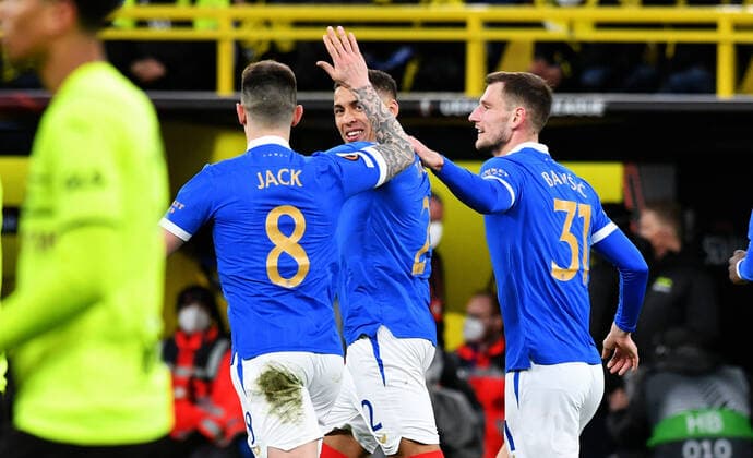 Football, UEFA Europe League, men, season 2021 22, knockout round play off first leg, Borussia Dortmund yellow Glasgow Rangers blue cheering James Tavernier GLR after his goal to 0 1 from penalty kick cheering, joy, action UEFA REGULATES PROHIBIT ANY USE OF PHOTOGRAPHS AS IMAGE SEQUENCES AND OR QUASI VIDEO