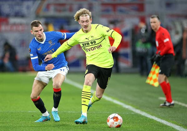 17 02 2022, Football UEFA Europa League 2021 2022, Play Off, Borussia Dortmund Glasgow Rangers, at Signal Iduna Park Dortmund L R Borna Barisic Glasgow Rangers vs Julian Brandt Borussia Dortmund DFL and DFB regulations prohibit any use of photographs as image sequences and or quasi video