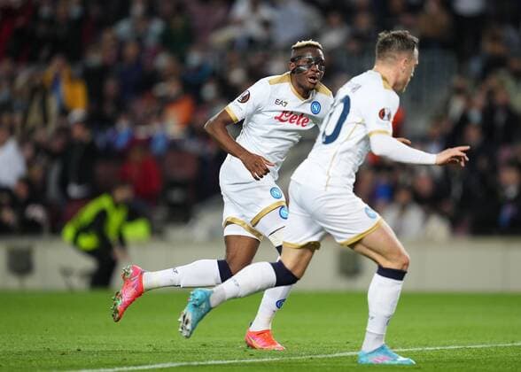 Mandatory Credit: Photo by Bagu Blanco Pressinphoto Shutterstock (12811548t) Piotr Zielinski of SCC Napoli celebrates with is teammate Victor Osimhen after scoring the opening goal FC Barcelona, Barca v SCC Napoli, UEFA Europa League 2021-2022, round of 16, first leg. Football, Camp Nou Stadium, Barcelona, Spain - 17 Feb 2021 Editorial use only FC Barcelona v SCC Napoli, UEFA Europa League 2021-2022, round of 16, first leg. Football, Camp Nou Stadium, Barcelona, Spain - 17 Feb 2021 Editorial use only Copyright: xBaguxBlanco Pressinphoto Shutterstockx 12811548t