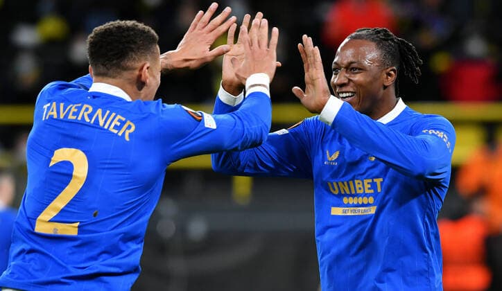 Football, UEFA Europe League, men, season 2021 22, knockout round play off first leg, Borussia Dortmund yellow Glasgow Rangers blue cheering Joe Aribo GLR after the goal to 0 2 by Alfredo Morelos GLR , together with James Tavernier GLR cheering, joy, action UEFA REGULATIONS PROHIBIT ANY USE OF PHOTOGRAPHS AS IMAGE SEQUENCES AND OR QUASI VIDEO