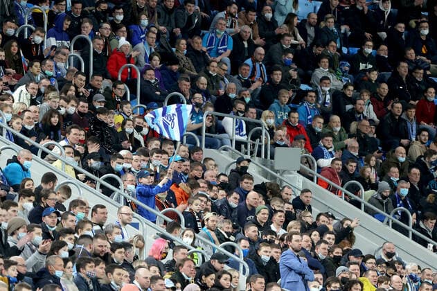 ST PETERSBURG, RUSSIA - FEBRUARY 17, 2022: Zenit s fans cheer during the 1st leg of the 2021 22 UEFA Europa League play-offs between Zenit St Petersburg and Real Betis Seville at Gazprom Arena. Alexander Demianchuk TASS  TS123F0F