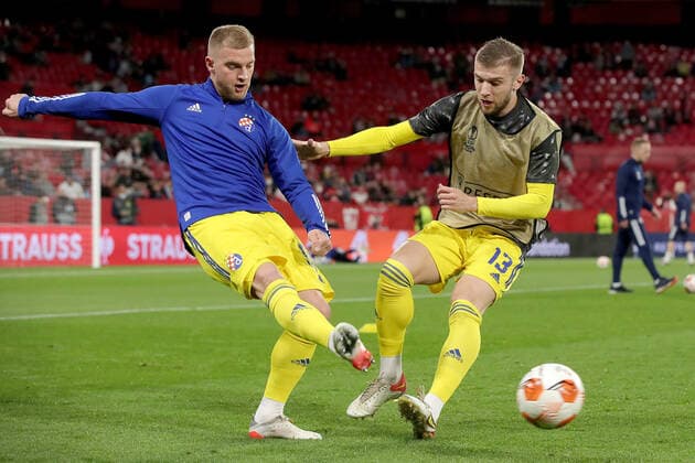 Sevilla FC v Dinamo Zagreb: Knockout Round Play-Offs Leg One - UEFA Europa League Petar Bockaj of Dinamo Zagreb and Stefan Ristovski of Dinamo Zagreb warm up prior the UEFA Europa League Knockout Round Play-Offs Leg One match between Sevilla FC and Dinamo Zagreb at Estadio Ramon Sanchez Pizjuan on February 17, 2022 in Seville, Spain. GoranxStanzl PIXSELL