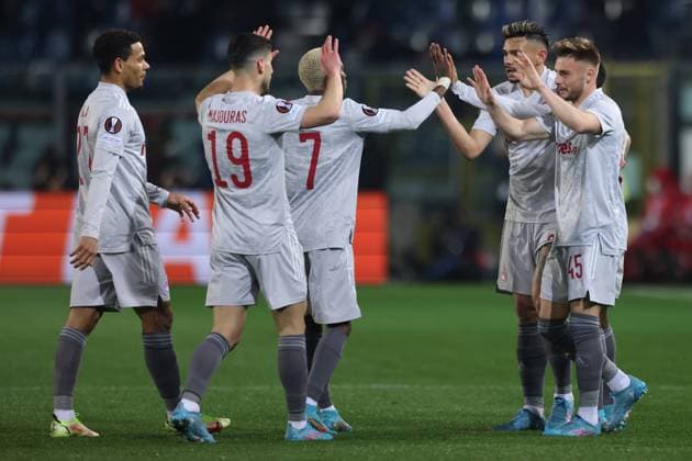 Bergamo, Italy, 17th February 2022. Tiquinho Soares of Olympiacos FC celebrates with team mates after scoring to give the side a 1-0 lead during the UEFA Europa League match at Gewiss Stadium, Bergamo. Picture credit should read: Jonathan Moscrop Sportimage EDITORIAL USE ONLY. No use with unauthorised audio, video, data, fixture lists, club league logos or live services. Online in-match use limited to 120 images, no video emulation. No use in betting, games or single club league player publications. SPI-1536-0006