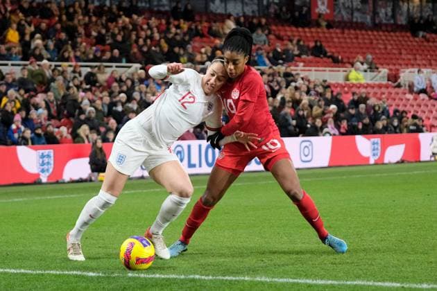 The Riverside Stadium, Middlesbr Lucy Bronze (England, 12) and Ashley Lawrence (Canada, 10) during the Arnold Clark Cup match between England and Canada at The Riverside Stadium in Middlesbrough, England Arnold Clark Cup Alex Todd SPP England v Canada 