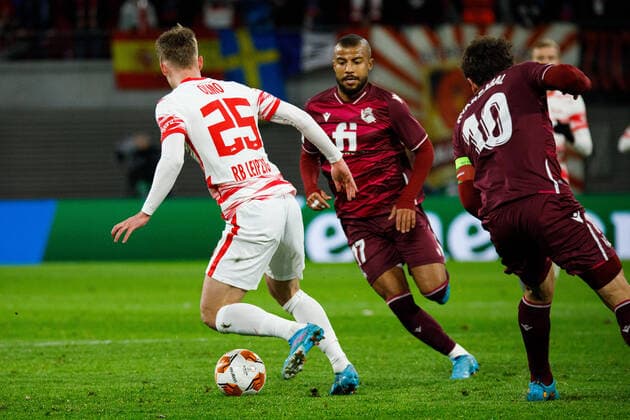 Leipzig, Germany 17 February 2022 Europa League 2021 2022 RB Leipzig vs San Sebastian in duel Dani Olmo RB Leipzig and Rafinha Real Sociedad Red Bull Stadion Saxony Copyright: xFotostandx xMatybax