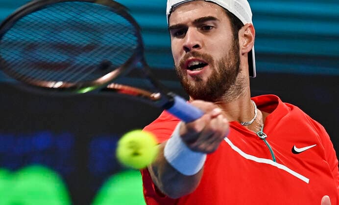 (220218) -- DOHA, Feb. 18, 2022 -- Karen Khachanov of Russia returns the ball during the quarterfinal of ATP, Tennis Herren Qatar Open Tennis match against Marin Cilic of Croatia at Khalifa International Tennis Complex in Doha, capital of Qatar, Feb. 17, 2022. (Photo by Xinhua) (SP)QATAR-DOHA-TENNIS-ATP QATAR OPEN-QUARTERFINAL Nikku 