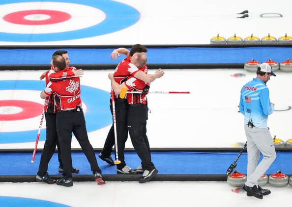 Sport Bilder des Tages (220218) -- BEIJING, Feb. 18, 2022 -- Athletes of Canada celebrate winning the curling man s bronze medal game of the Beijing 2022 Winter Olympics between Canada and the United States at the National Aquatics center in Beijing, China, Feb.18, 2022. ) (BEIJING2022)CHINA-BEIJING-OLYMPIC Winter games, Winterspiele,Spiele, Summer games CURLING-MAN-BRONZE MEDAL-USA vs CAN(CN) YangxLei 