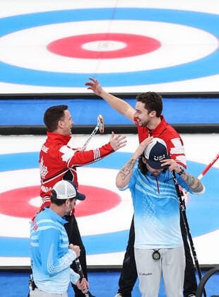 (220218) -- BEIJING, Feb. 18, 2022 -- Athletes of Canada (rear) celebrate winning the curling man s bronze medal game of the Beijing 2022 Winter Olympics between Canada and the United States at the National Aquatics center in Beijing, China, Feb.18, 2022. ) (BEIJING2022)CHINA-BEIJING-OLYMPIC Winter games, Winterspiele,Spiele, Summer games CURLING-MAN-BRONZE MEDAL-USA vs CAN(CN) YangxLei 