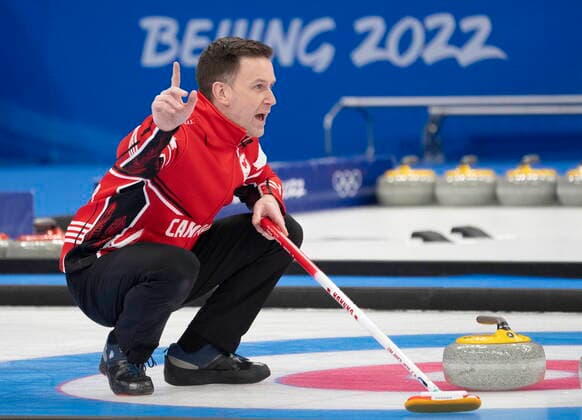 February 18, 2022, Beijing, China: CanadaöÄÃ s Brad Gushue calls the sweep on his way to winning the bronze medal curling match by beating the United States 8-5 Friday, February 18, 2022 at the 2022 Winter Olympics in Beijing. Brad Gushue,  - ZUMAc35_ 20220218_zaf_c35_052 Copyright: xRyanxRemiorzx