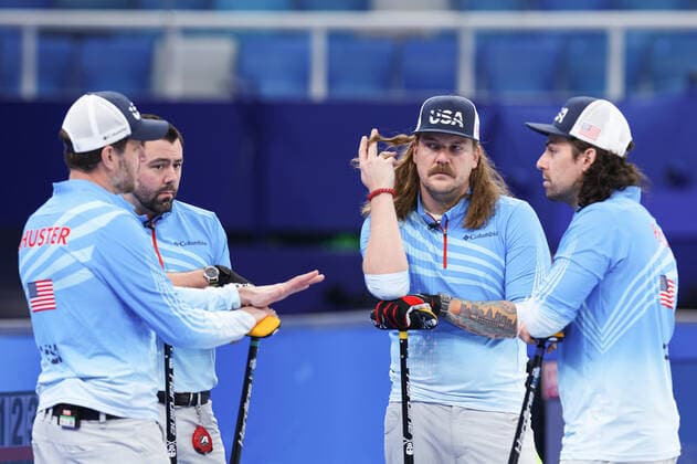 (220218) -- BEIJING, Feb. 18, 2022 -- John Shuster, John Landsteiner, Matt Hamilton and Christopher Plys (from L to R) of the United States react during the curling man s bronze medal game of the Beijing 2022 Winter Olympics between Canada and the United States at the National Aquatics center in Beijing, China, Feb.18, 2022. ) (BEIJING 2022)CHINA-BEIJING-OLYMPIC Winter games, Winterspiele,Spiele, Summer games CURLING-MAN-BRONZE MEDAL-USA vs CAN(CN) WangxJingqiang